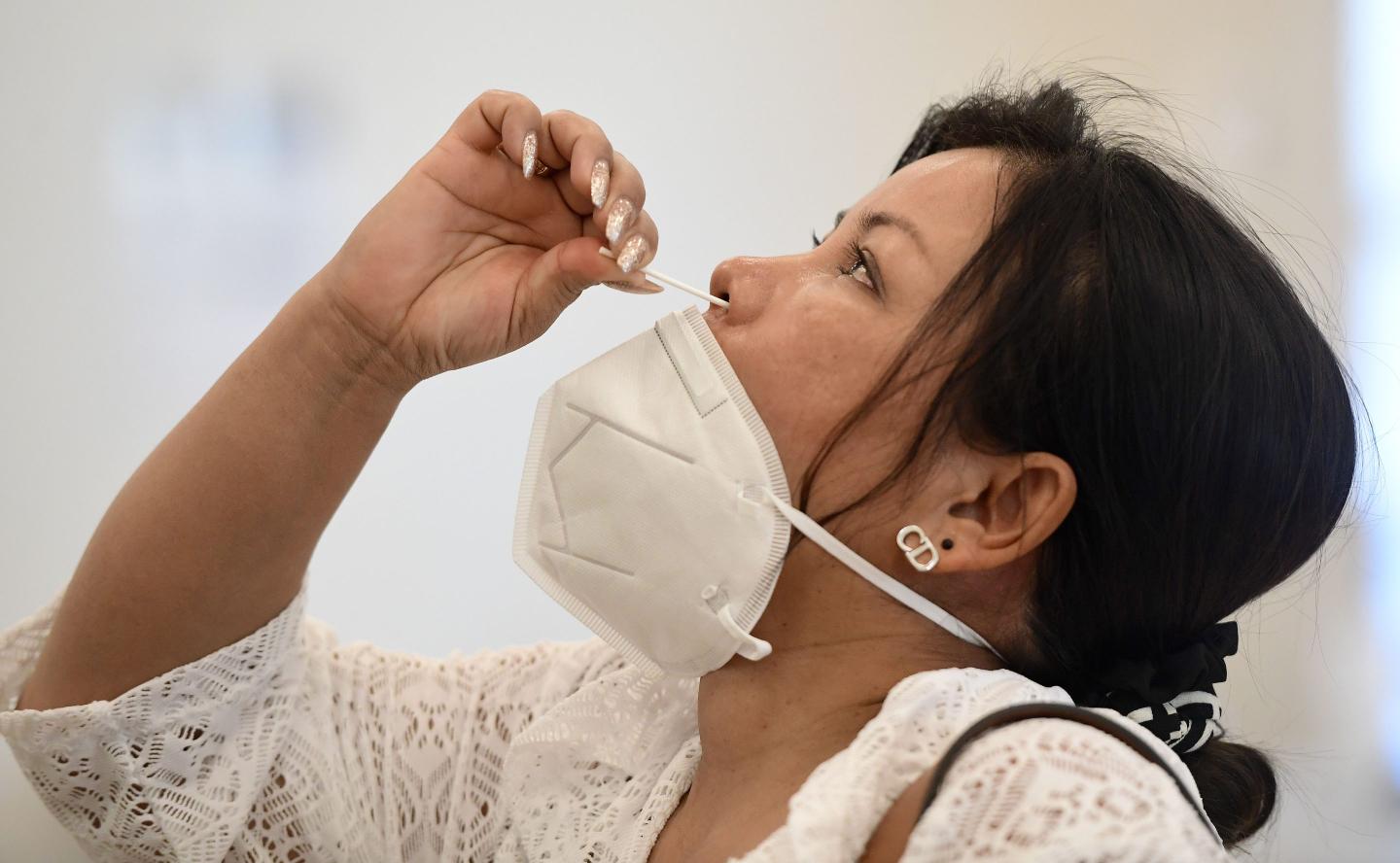 Woman gets COVID-19 test