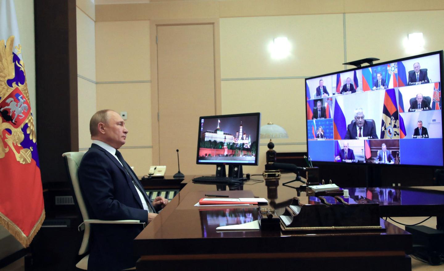 Vladimir Putin chairs a Security Council meeting via a video link