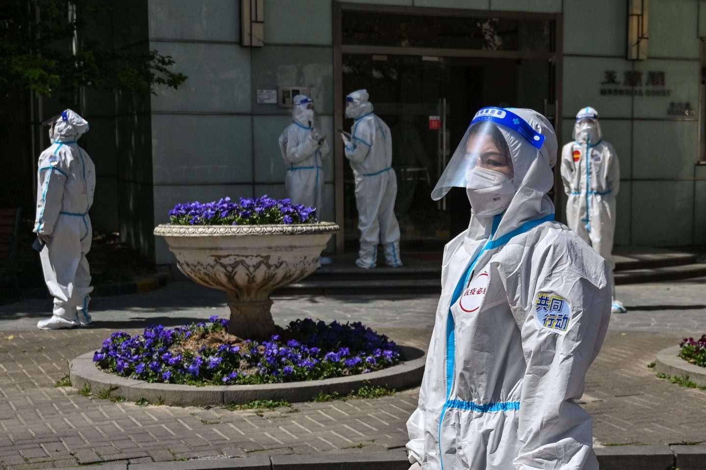Chinese health workers in protective gear in Shanghai