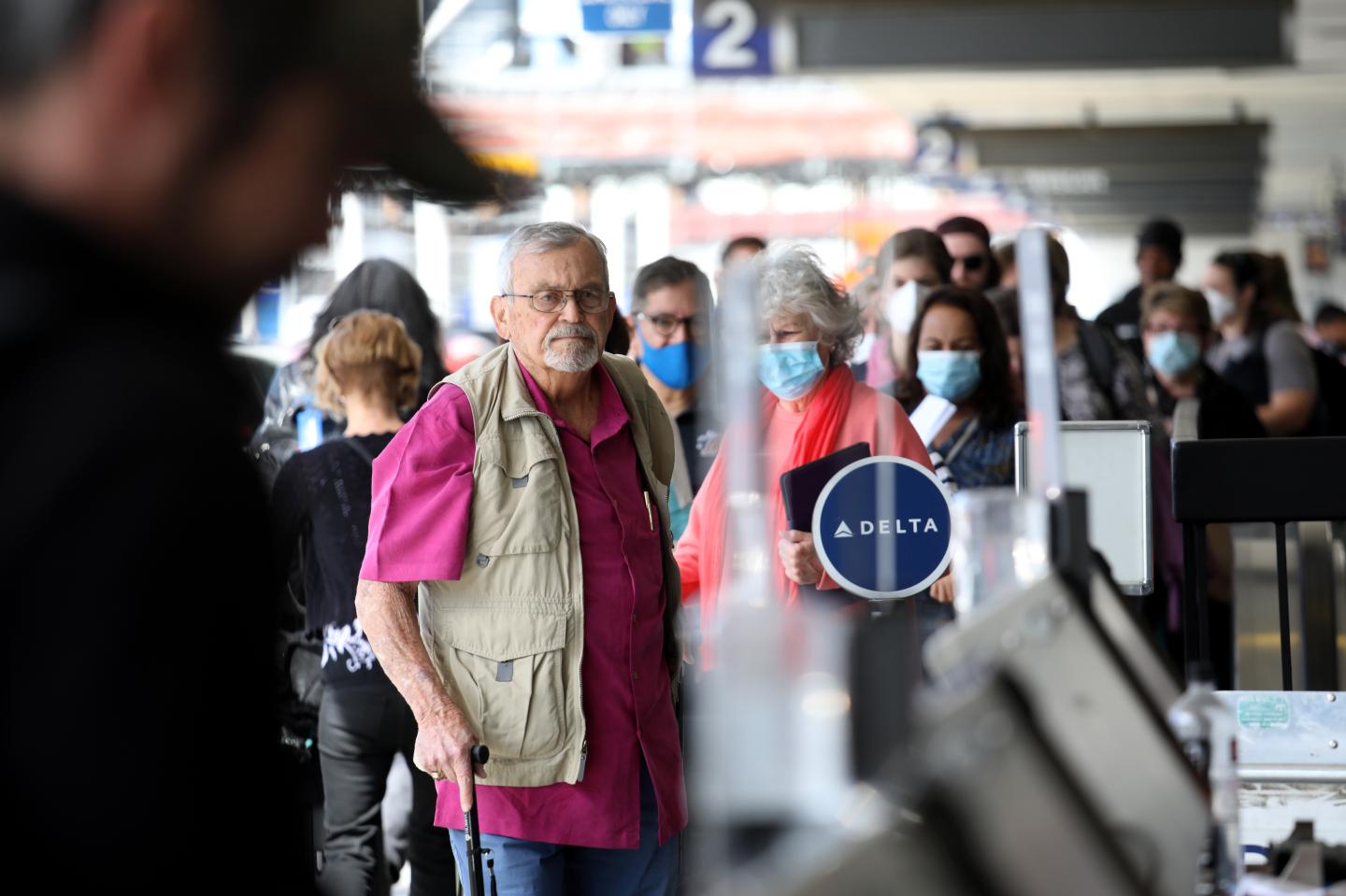 Passengers make their way through Delta Airlines Terminal Two at Los Angeles International Airport.