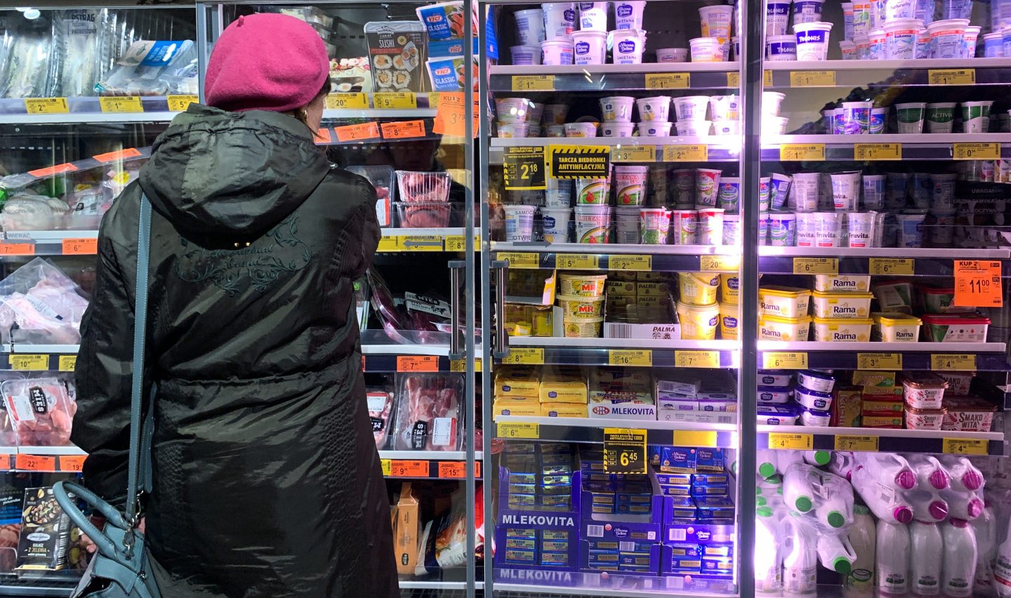 A woman shops at a supermarket in Poland.