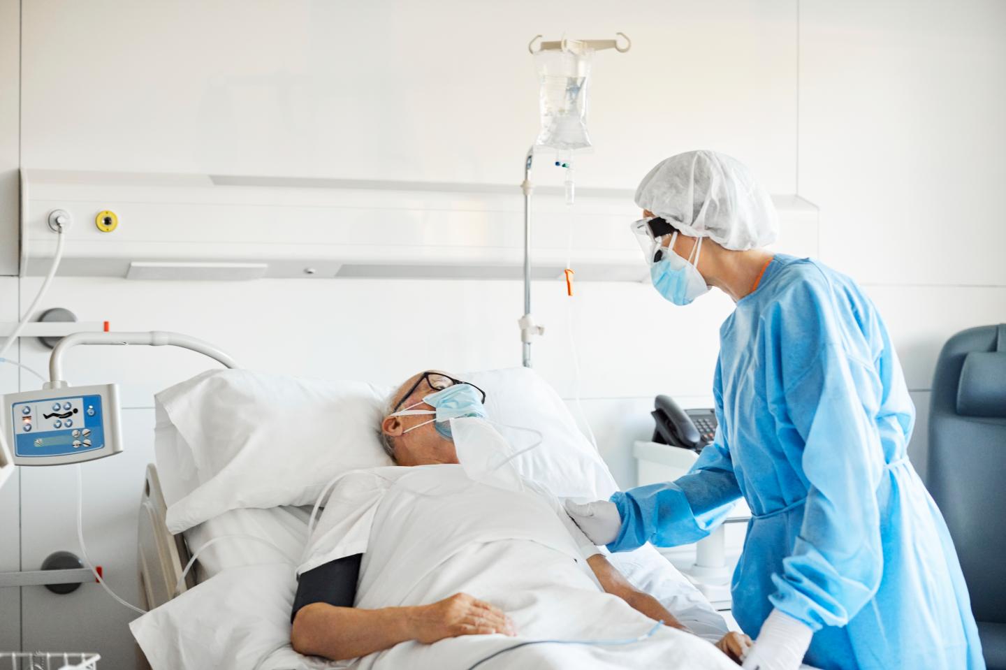 A man in a hospital bed.