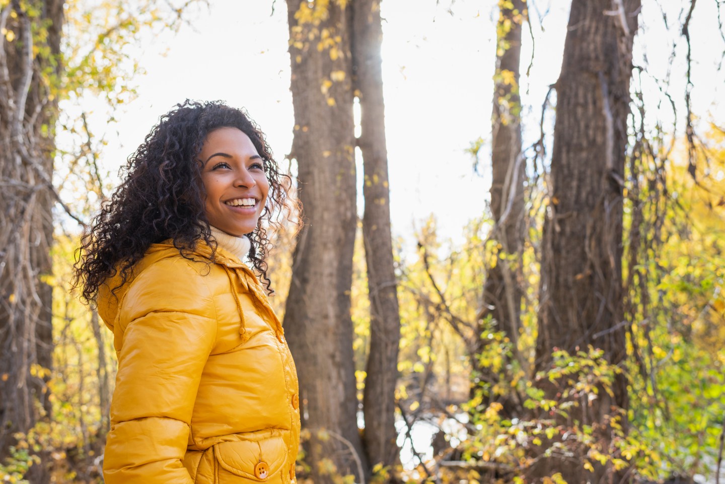 Young woman in autumn woods