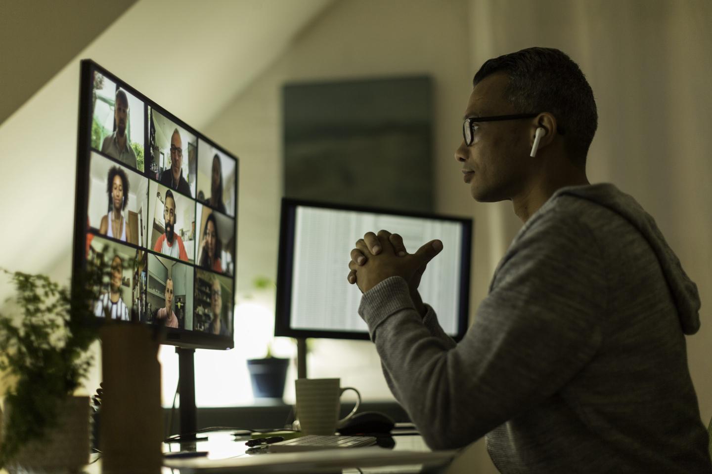 Businessman on video call from home office