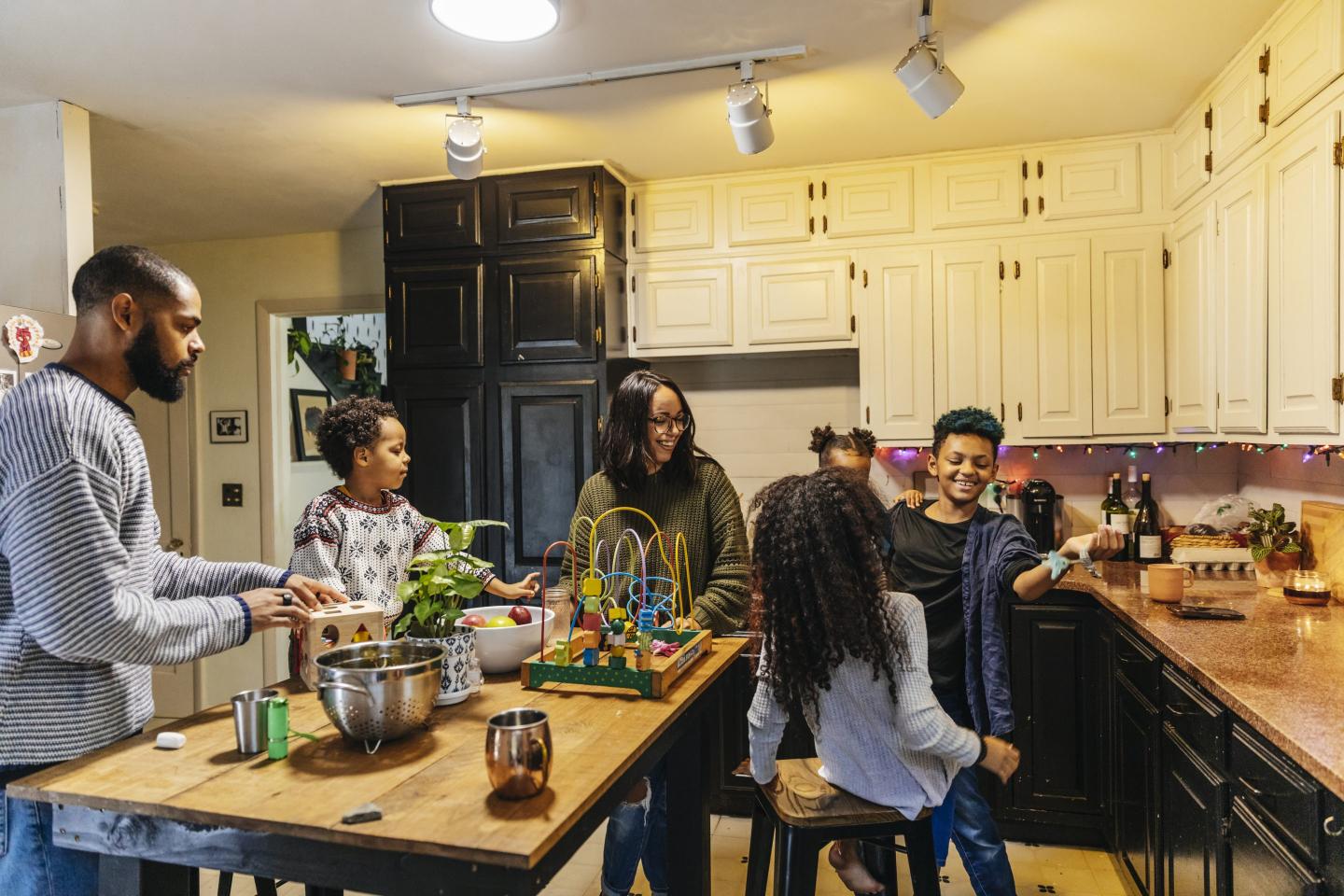 Photo of a family in their kitchen