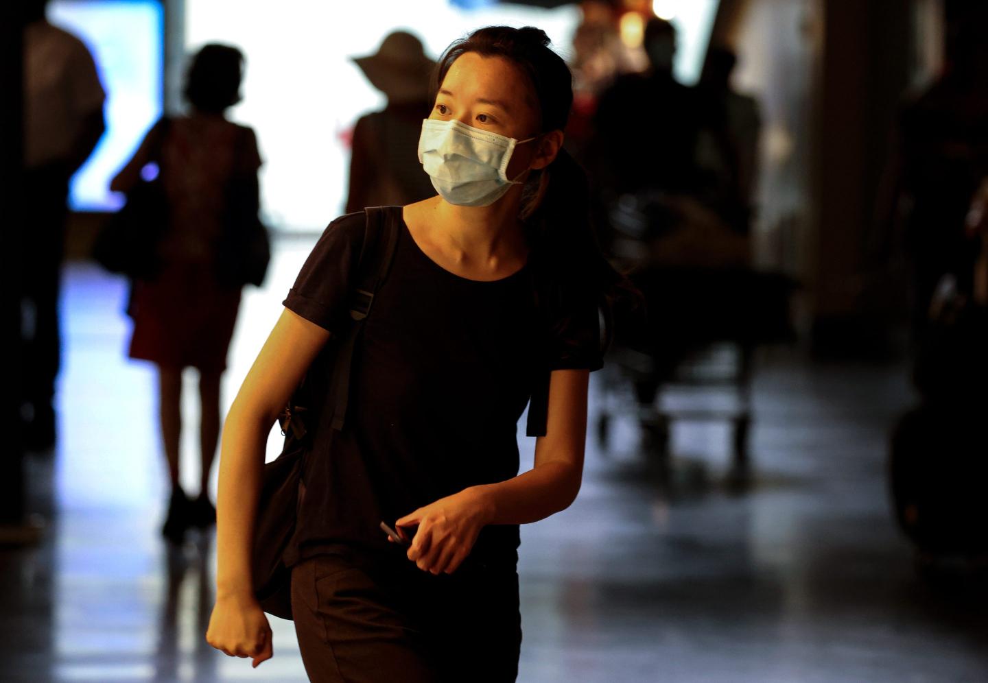 Woman wears a mask