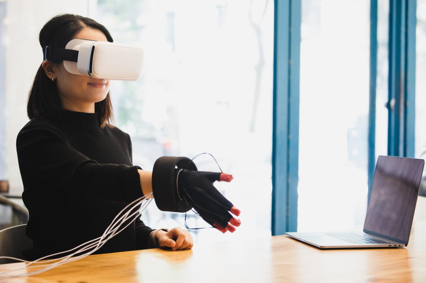 A woman wearing a VR headset.
