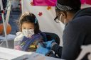 Young girl gets Pfizer COVID vaccine
