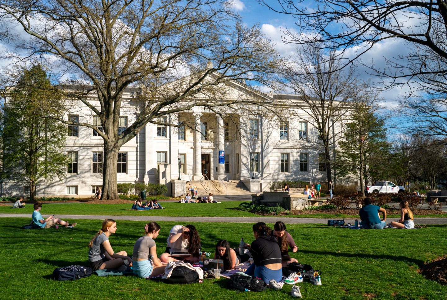 students sitting on campus