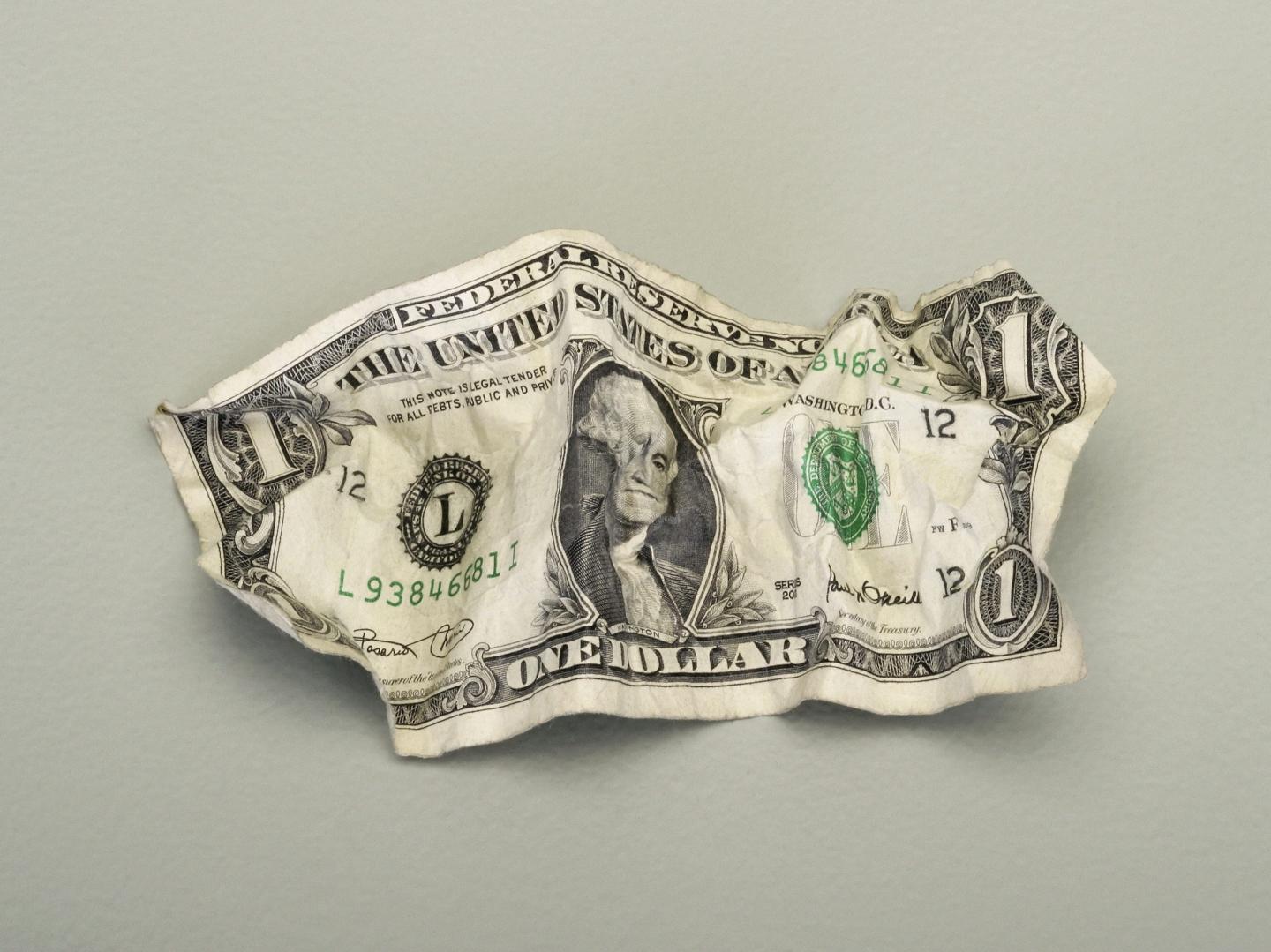 A crumpled U.S. dollar