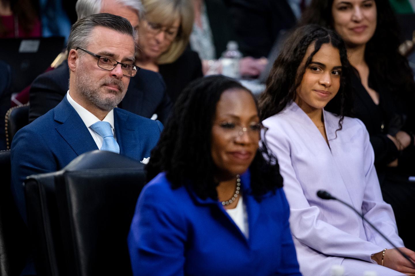 Patrick Jackson, husband of Kentanji Brown Jackson, and daughter Talia Jackson react during Senate Judiciary Committee confirmation hearings