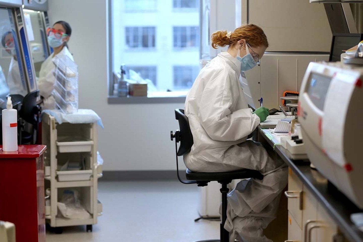Two Hewlett Packard Enterprise scientists in a lab
