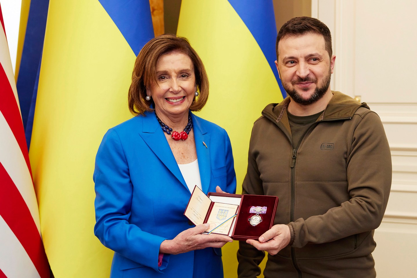In this image released by the Ukrainian Presidential Press Office on Sunday, May 1, Ukrainian President Volodymyr Zelenskyy, right, awards the Order of Princess Olga, the third grade, to U.S. Speaker of the House Nancy Pelosi in Kyiv, Ukraine, Saturday, April 30. Pelosi, second in line to the presidency after the vice president, is the highest-ranking American leader to visit Ukraine since the start of the war, and her visit marks a major show of continuing support for the country's struggle against Russia.