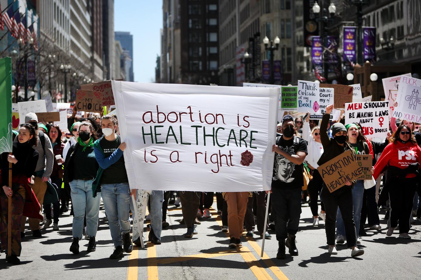 Abortion-rights demonstrators march through downtown Chicago on May 7, 2022