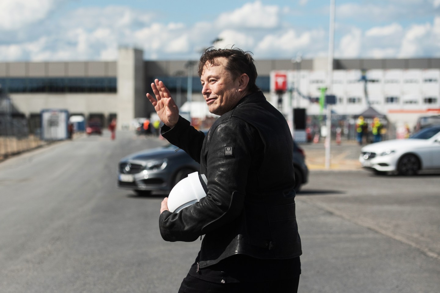 Elon Musk, Tesla CEO, stands on the construction site of the Tesla factory.