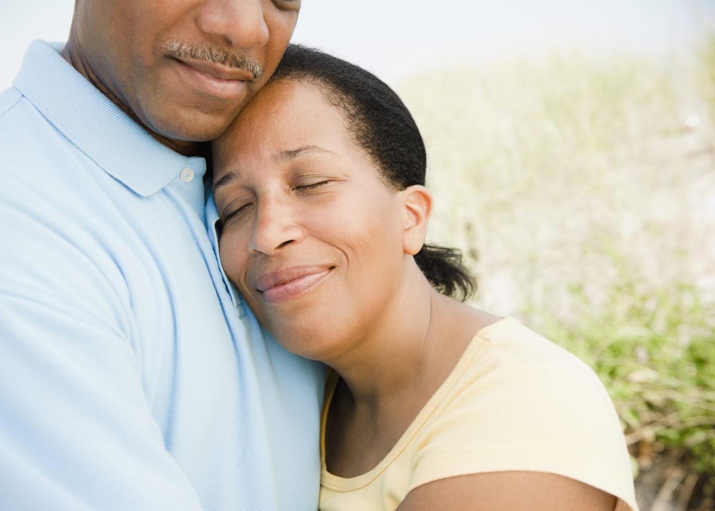 a man and woman couple hugging