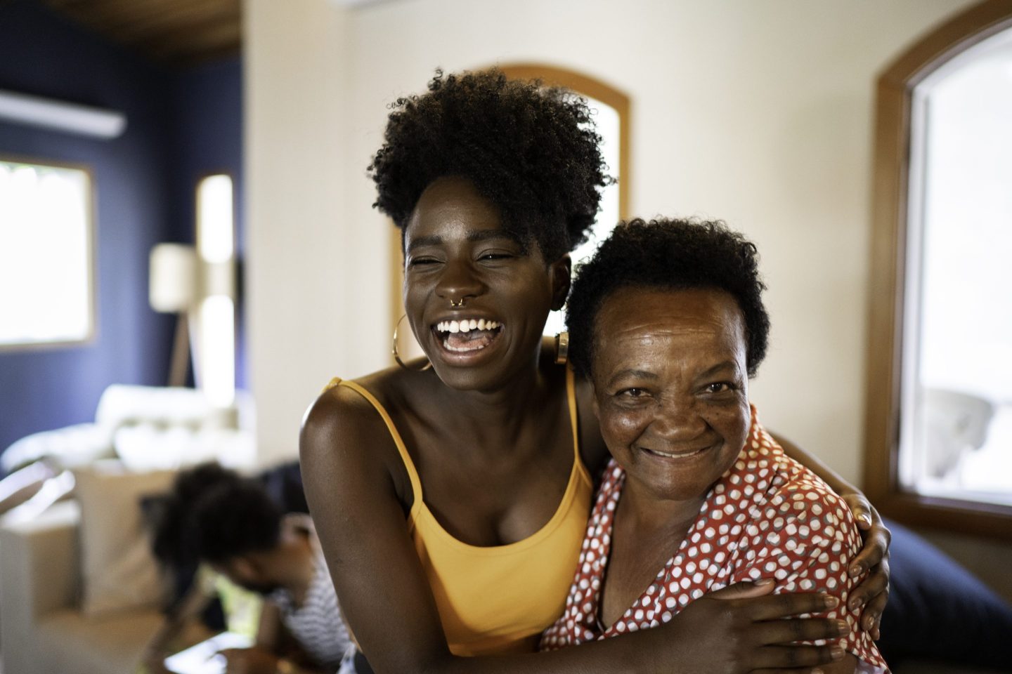 Happy mother and daughter embracing