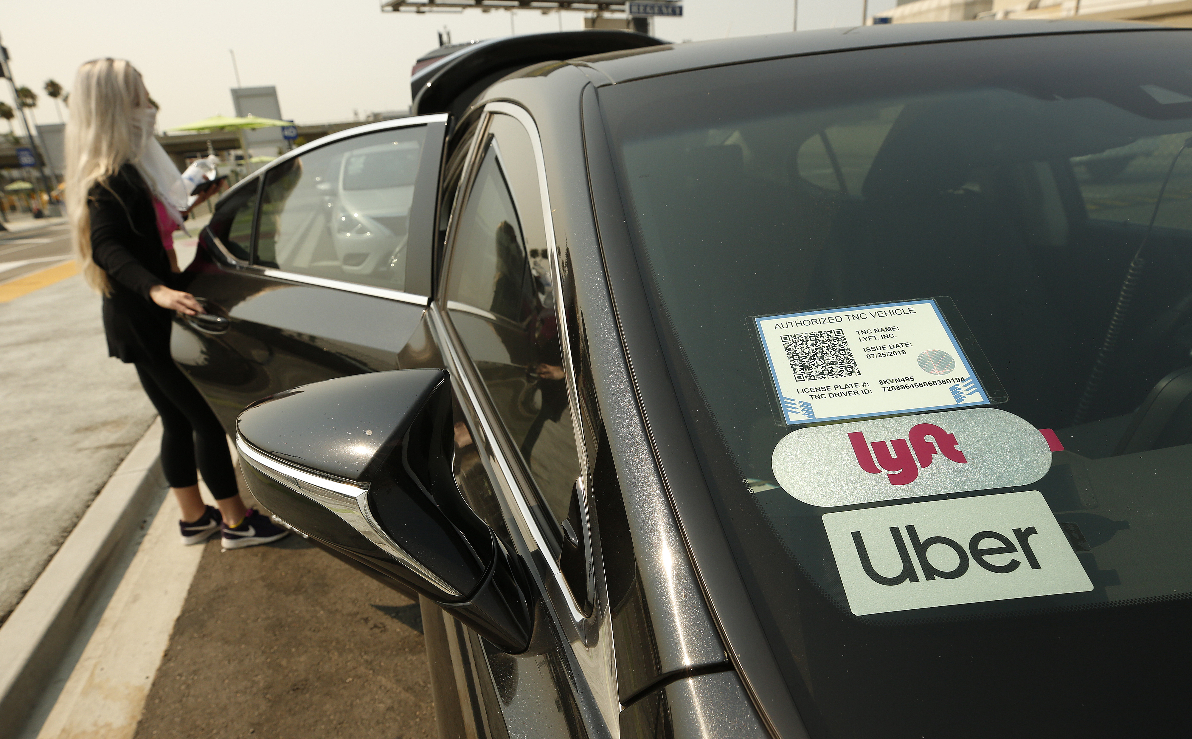 Passengers connect with drivers at the Rideshare Lot at LAX.