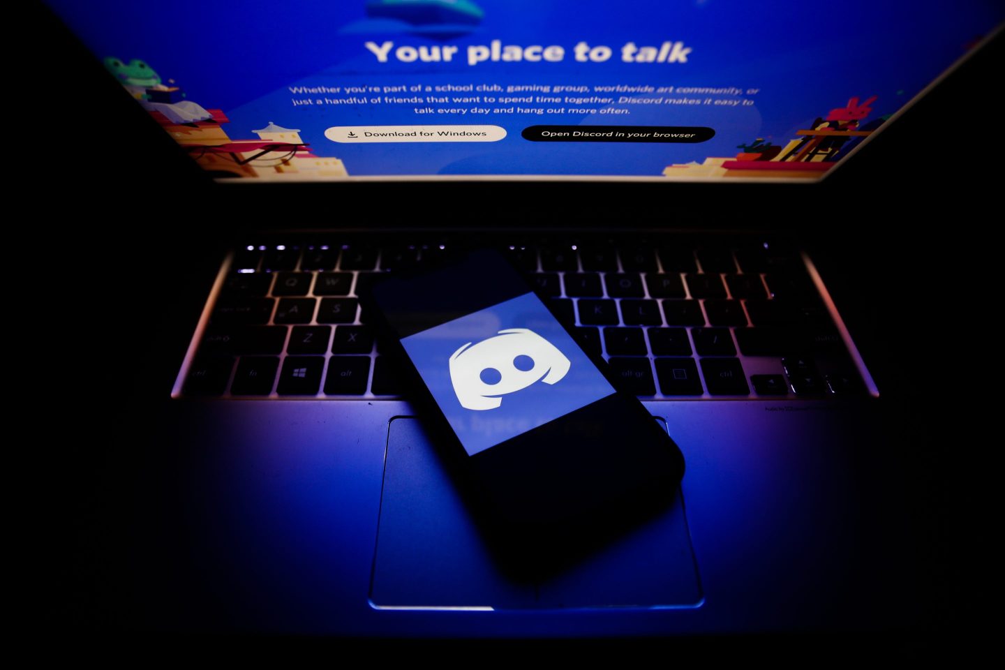 Discord logo displayed on a phone screen