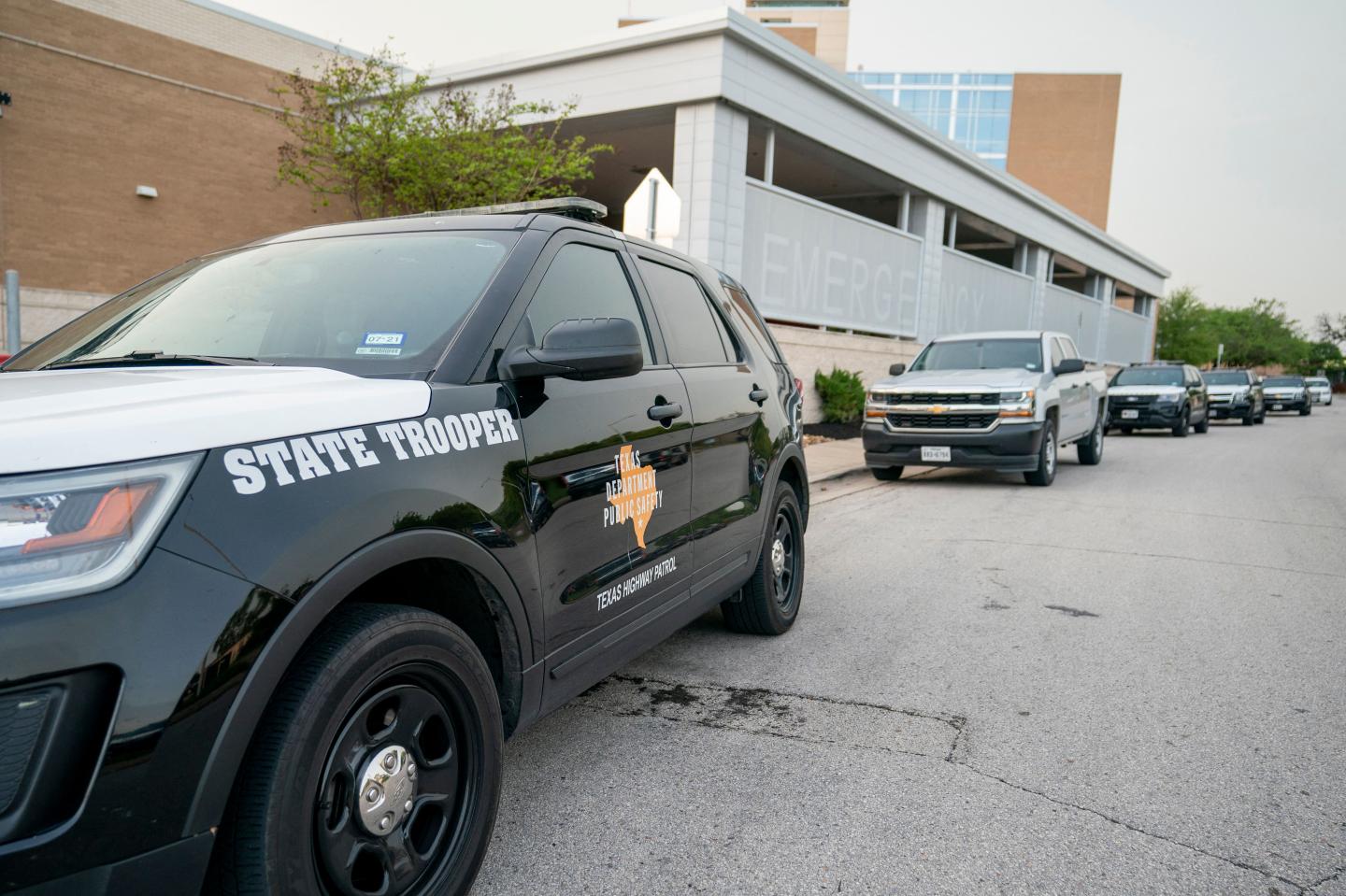 Texas Department of Public Safety patrol vehicles .