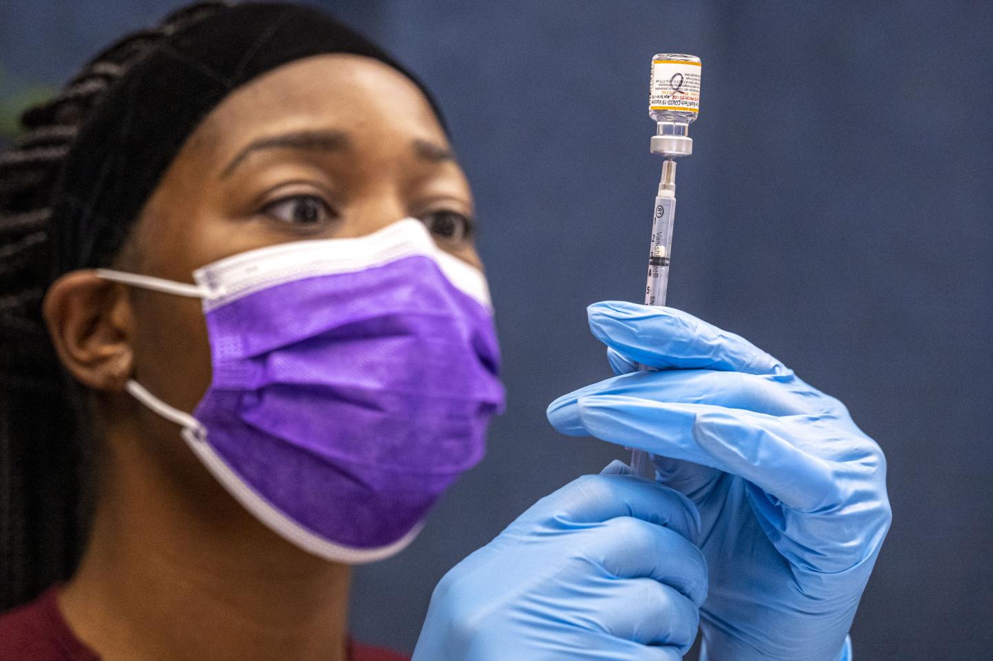 A nurse prepares a pediatric dose of the Pfizer-BioNTech Covid-19 vaccine.