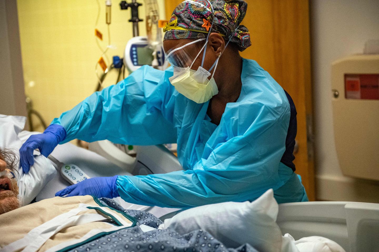 Medical worker works on patient in a Massachusetts hospital