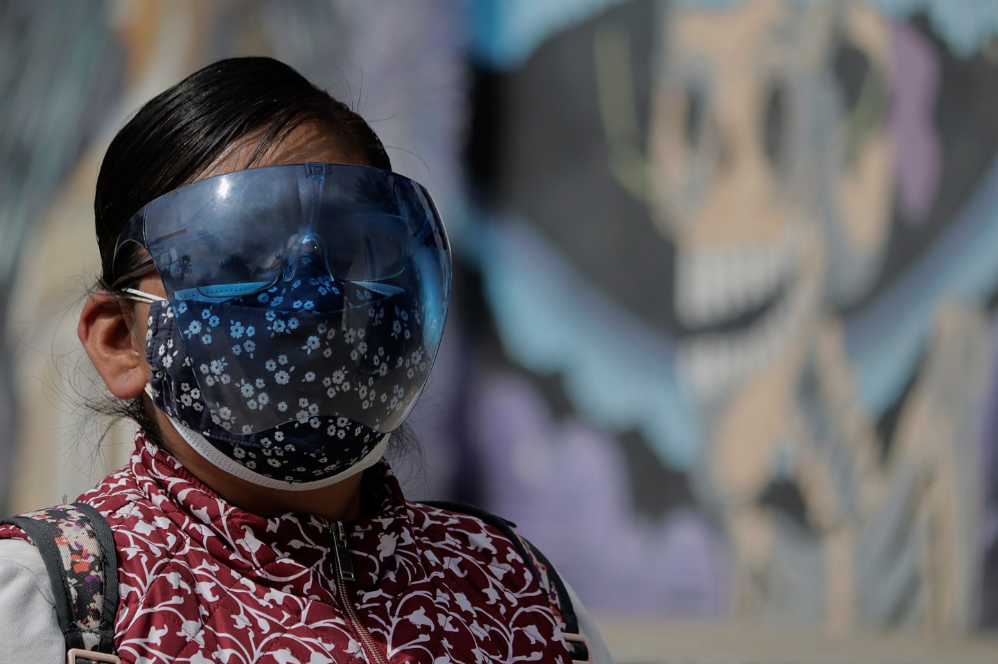A woman wears a face mask in Mexico City