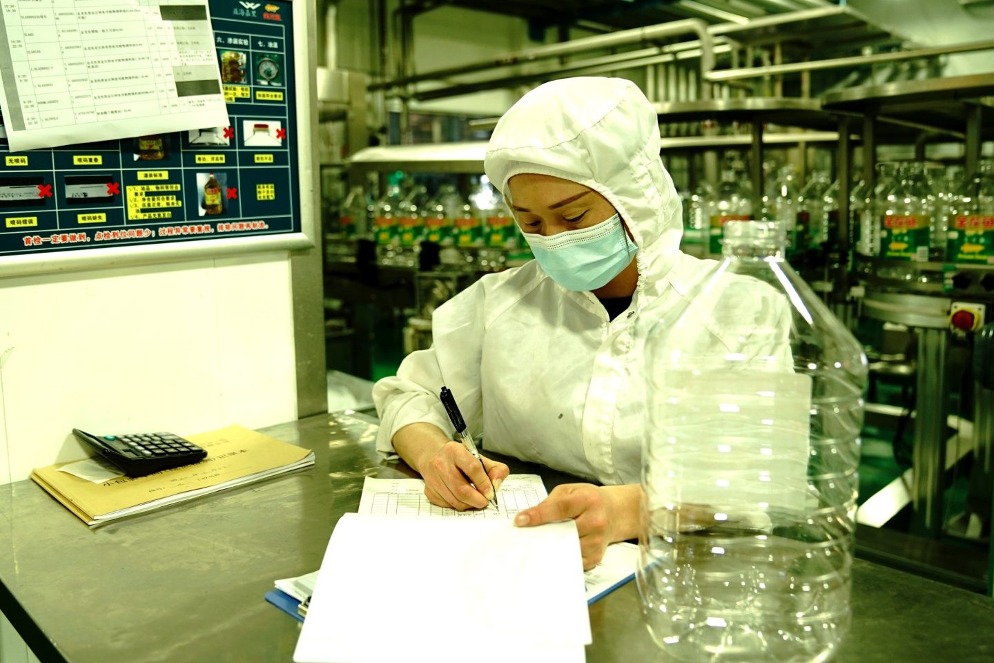 Shanghai-COVID-factory-woman-working