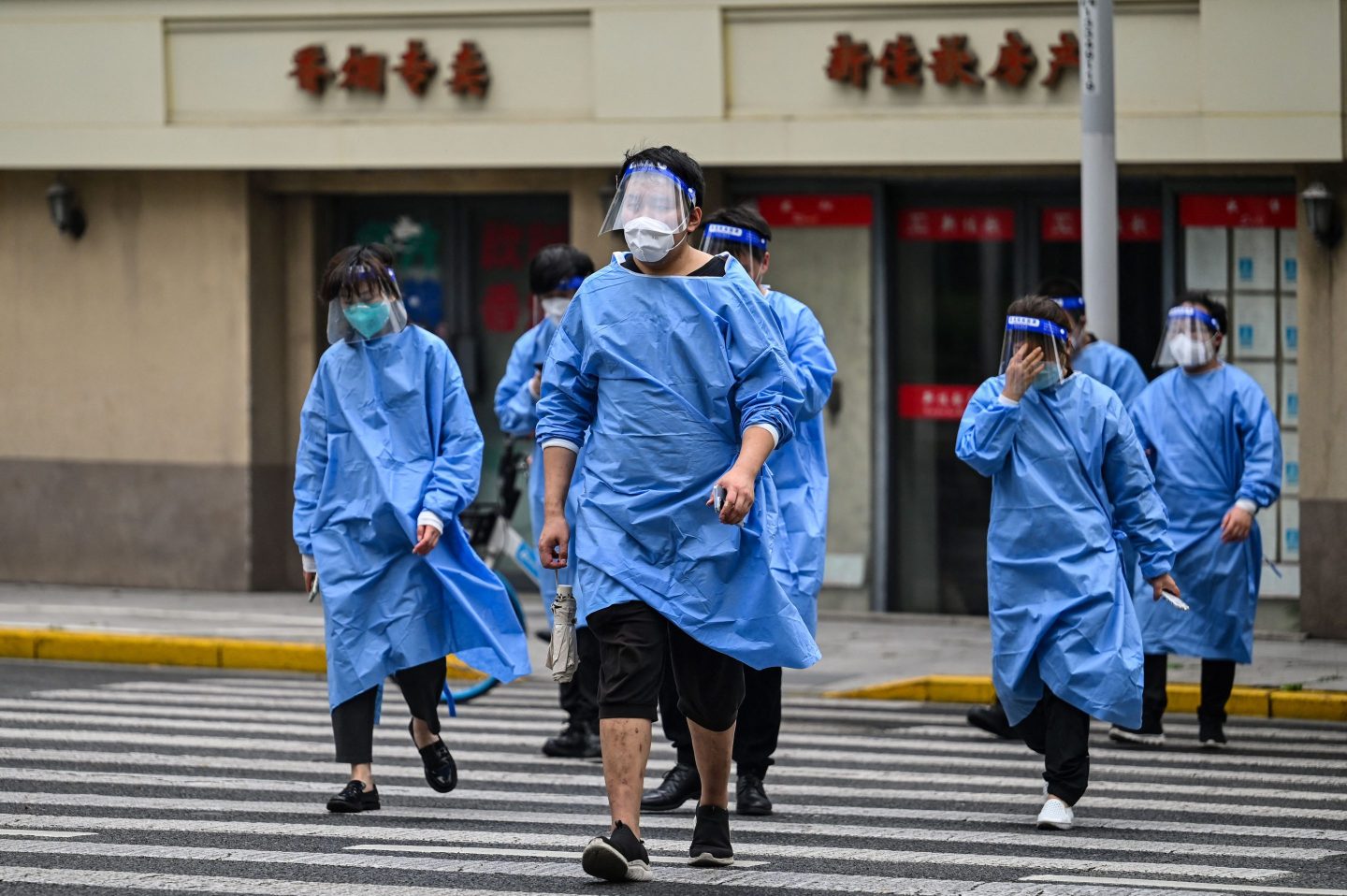 Health workers in Shanghai wearing protective gear