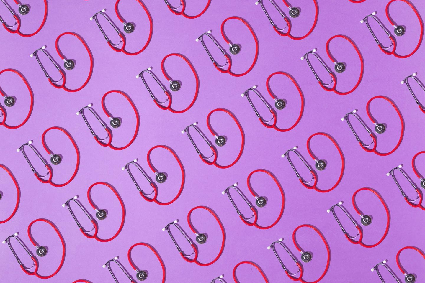 Red and silver stethoscopes pattern on a purple background.