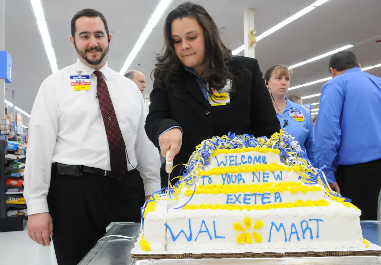 Walmart woos college grads with $210,000 future as store bosses