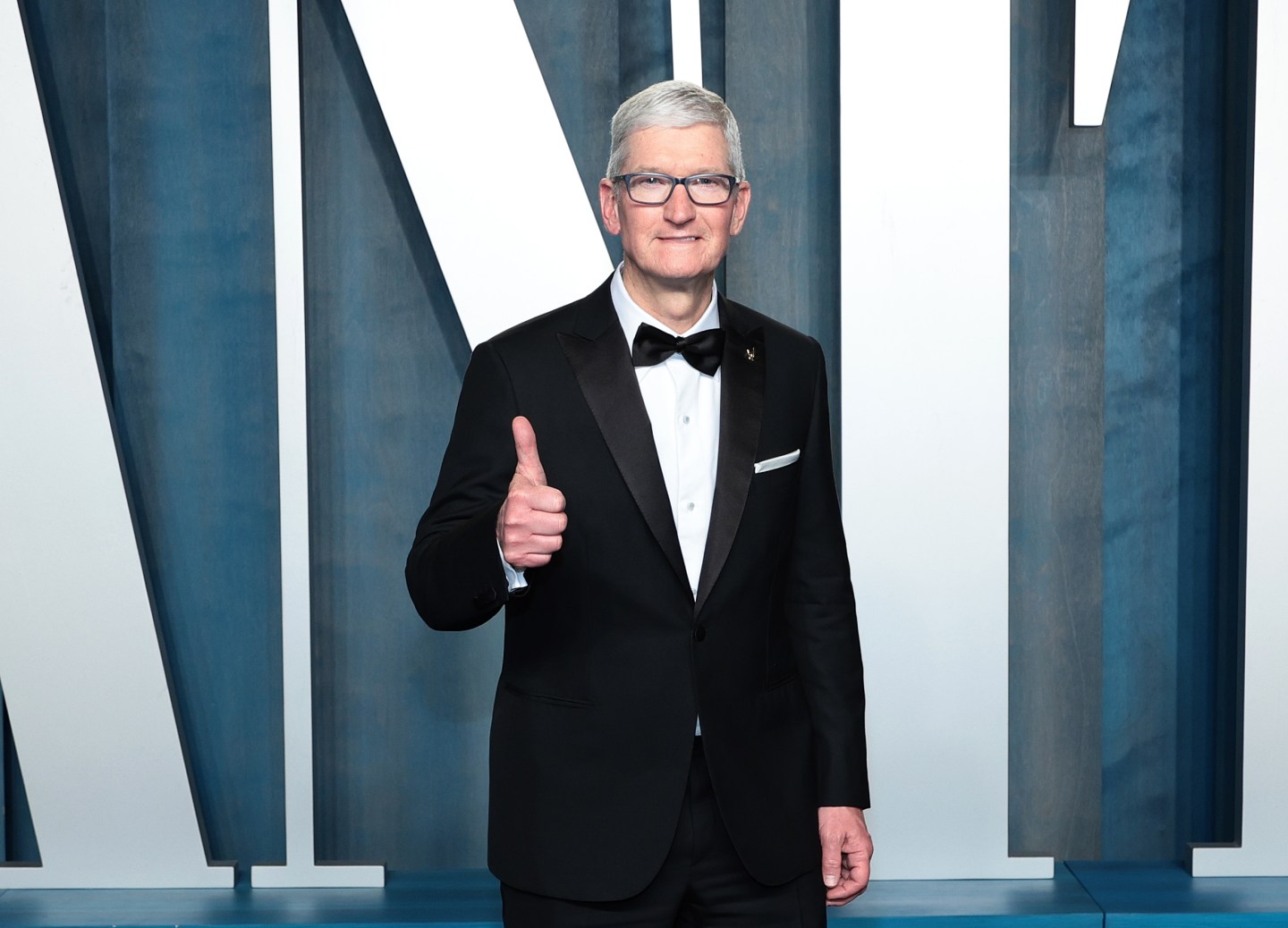Apple CEO Tim Cook gives a thumbs up