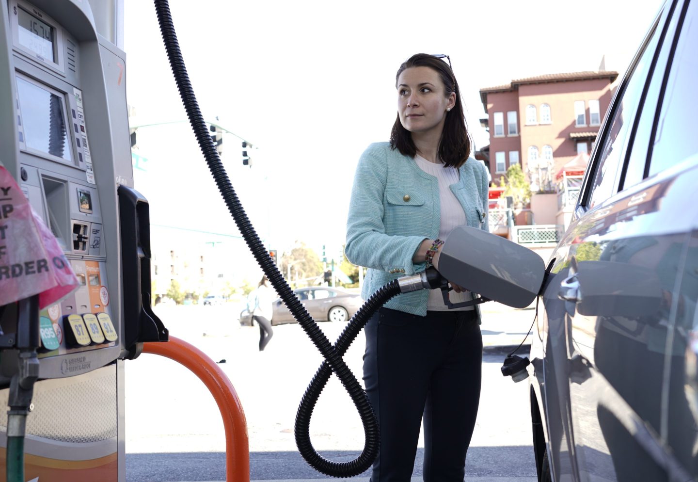 Woman at a gas station