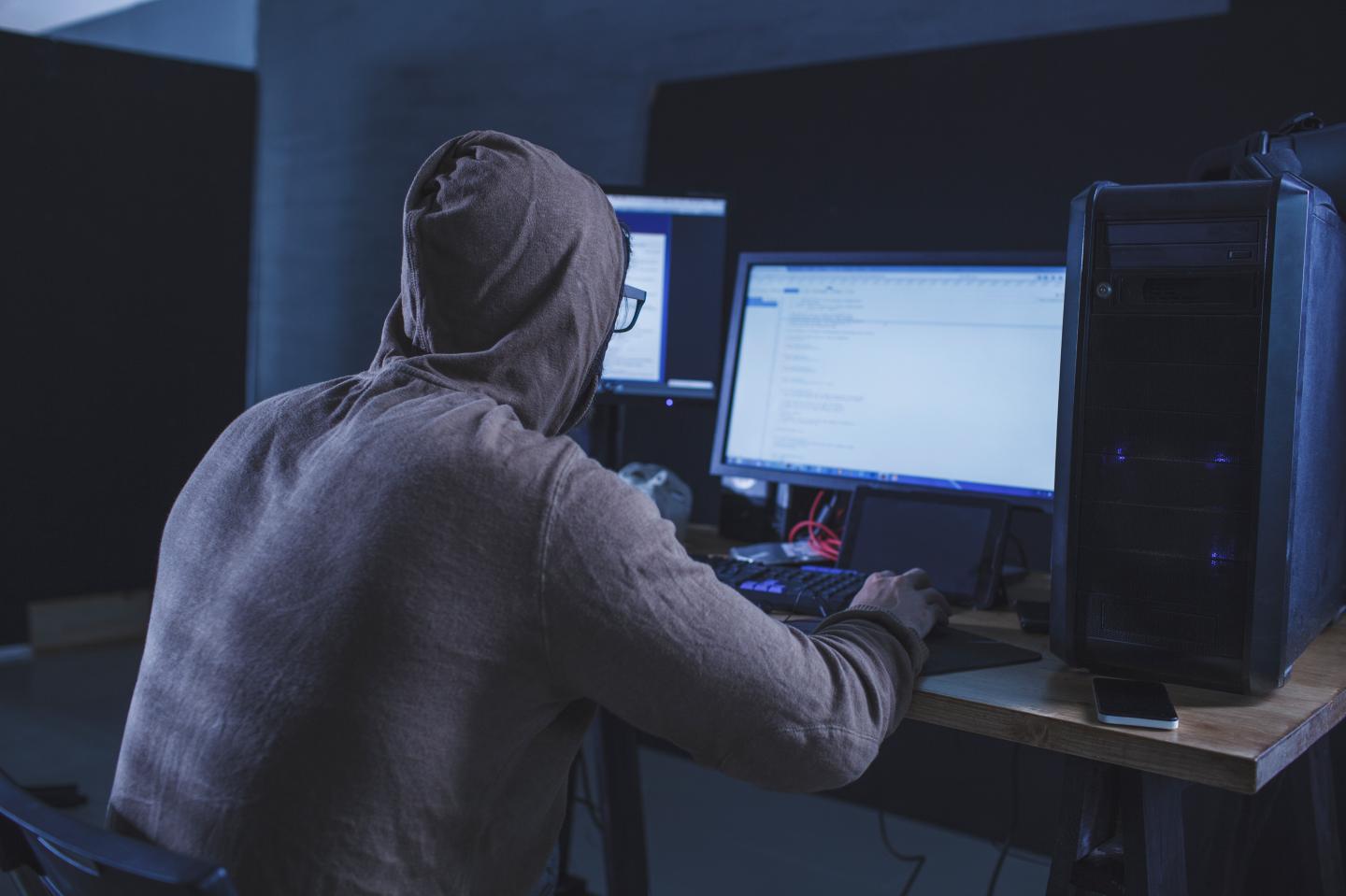 Man at a computer.