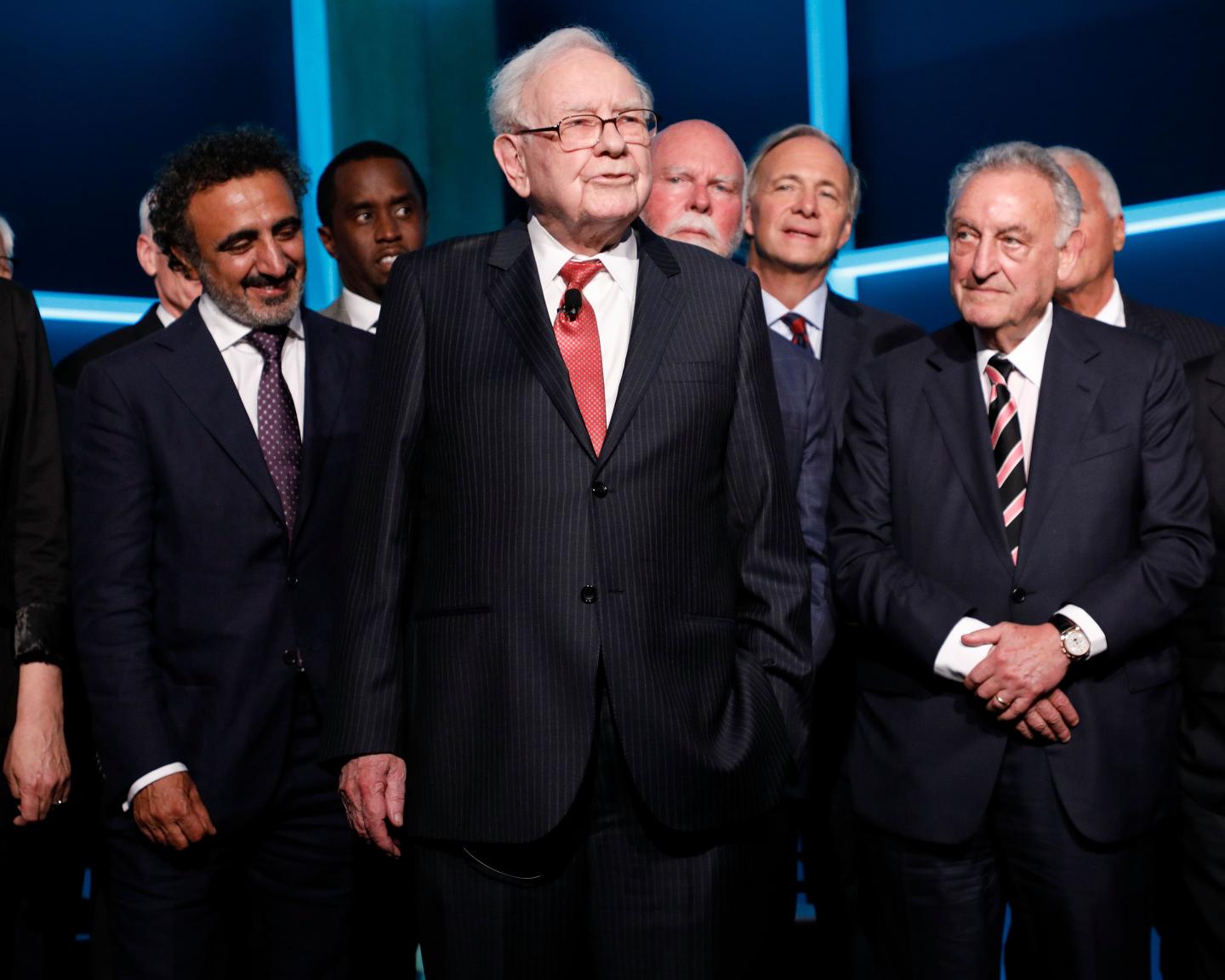 Buffett lures Omaha disciples with stock buys, inflation warning