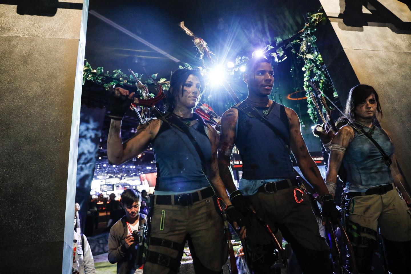 Actors dressed as characters from the video game Tomb Raider.