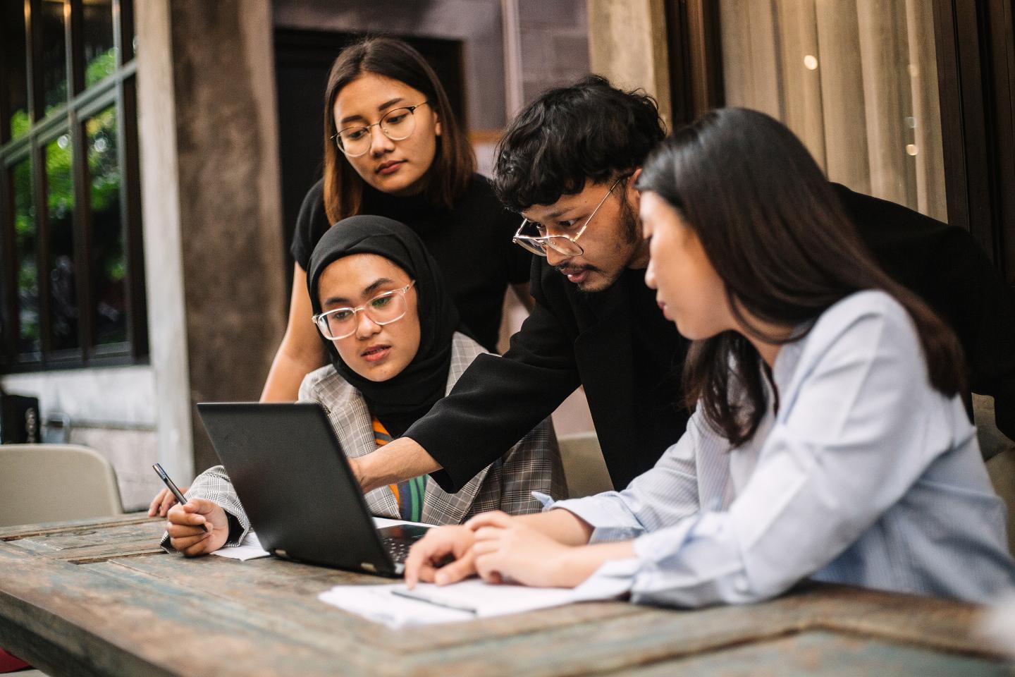 Meeting of young professionals in a co-working space