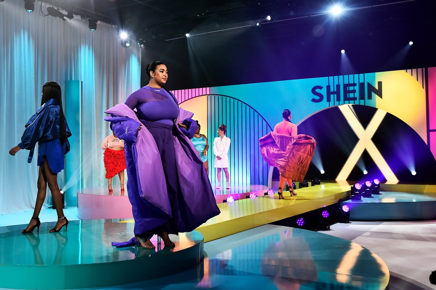 Models show off looks at a Shein-sponsored design competition in 2021.