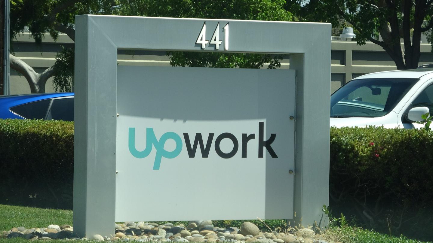 Close-up of sign at entrance to Silicon Valley headquarters of outsourcing and freelancing company Upwork, Mountain View, California, May 3, 2019.