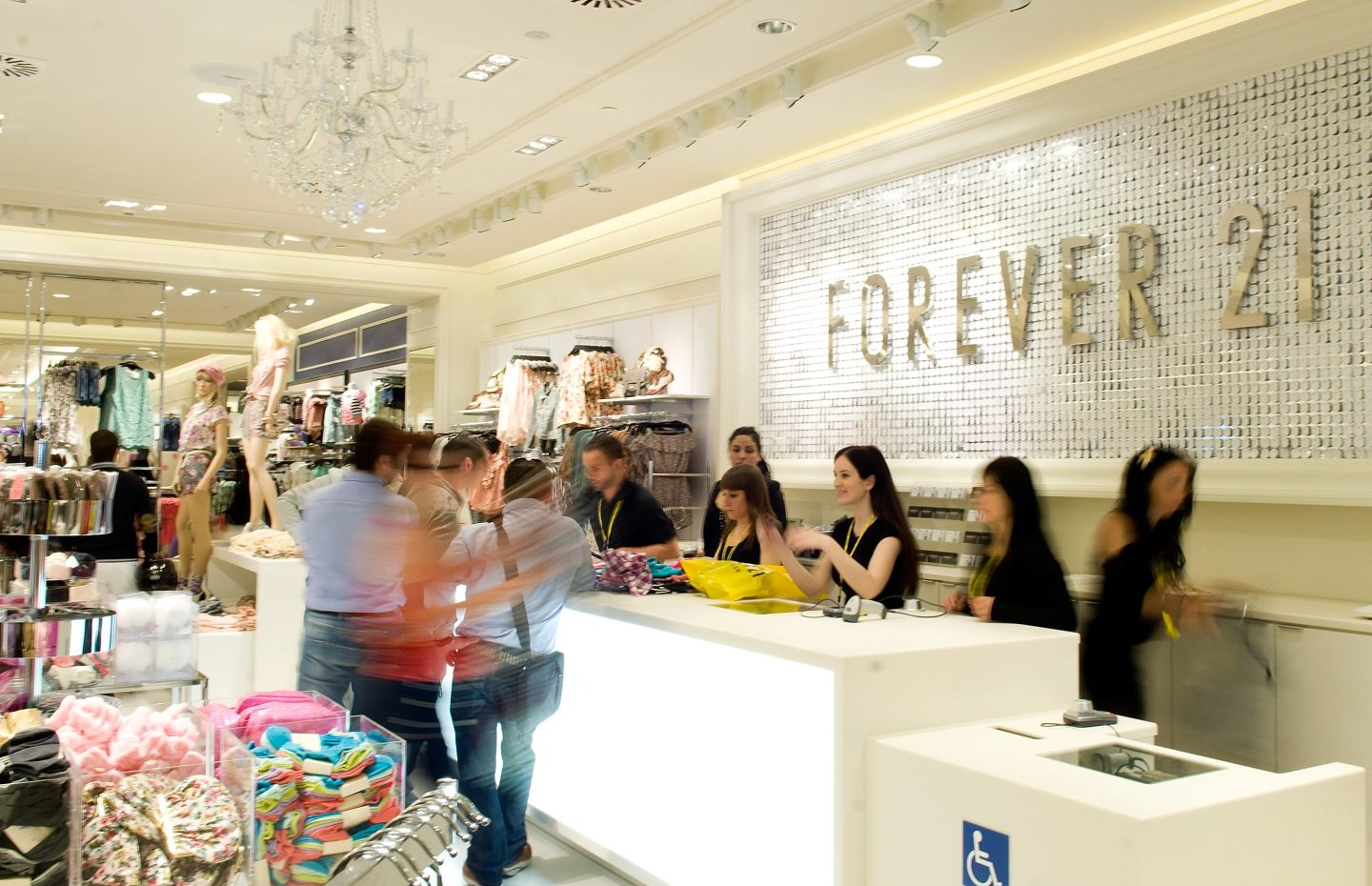 Photo of Forever 21 staff and shoppers at the store's grand opening in Barcelona, Spain, on June 4, 2011.