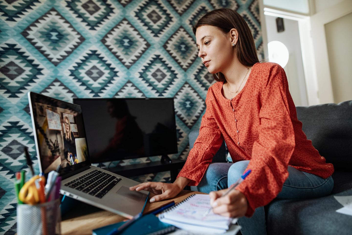 Young woman working at home