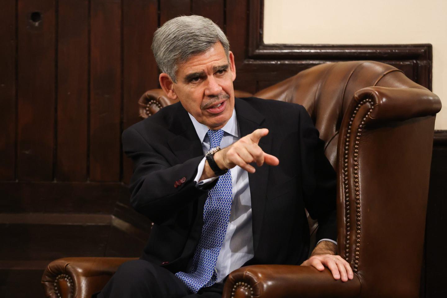 Mohamed El-Erian points to an audience member during at event at The Cambridge Union.
