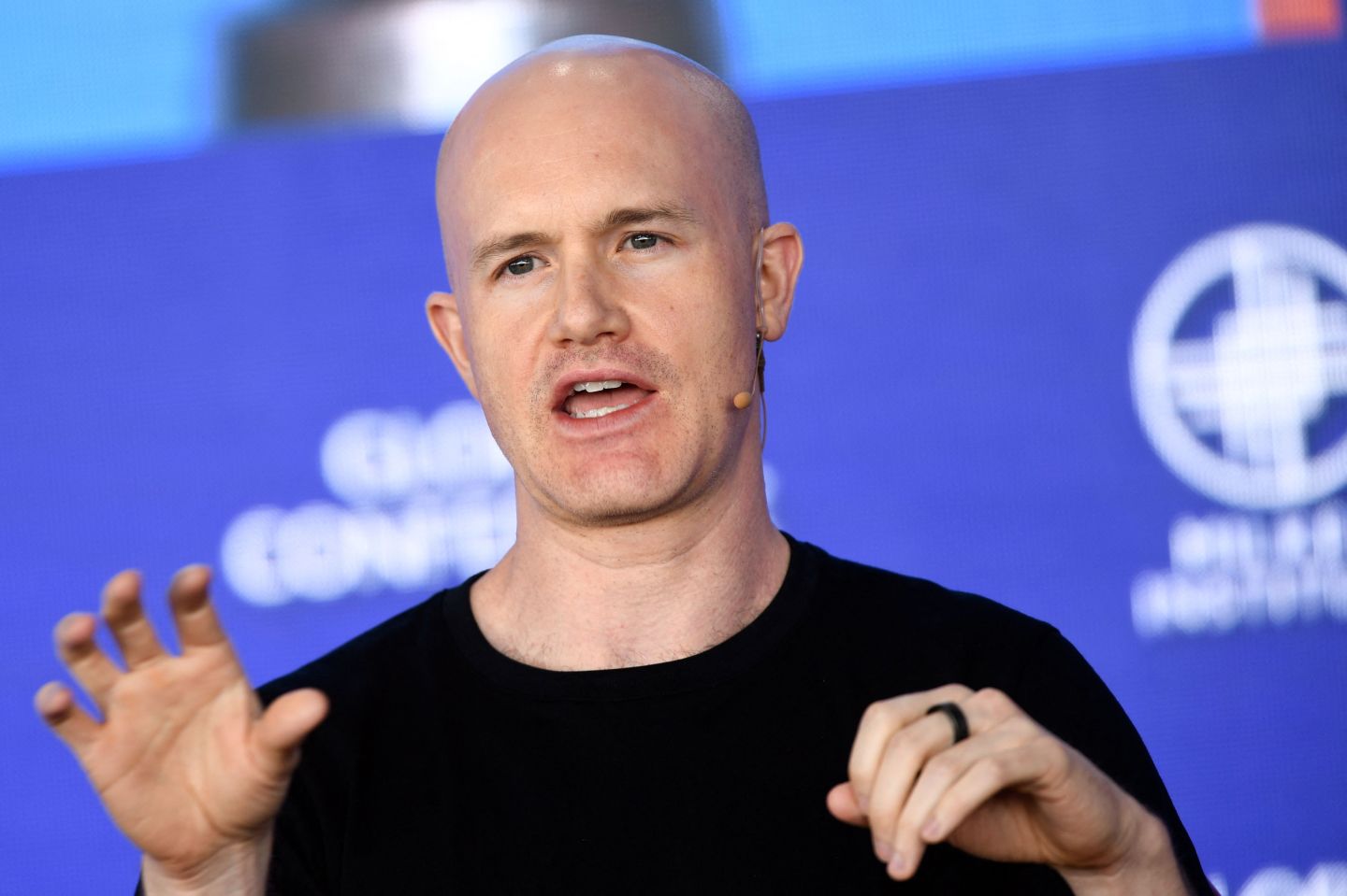 Brian Armstrong, CEO and Co-Founder, Coinbase, speaks during the Milken Institute Global Conference on May 2, 2022 in Beverly Hills, Calif. After freezing its hiring process and rescinding job offers, Coinbase laid off 1,100 employees.