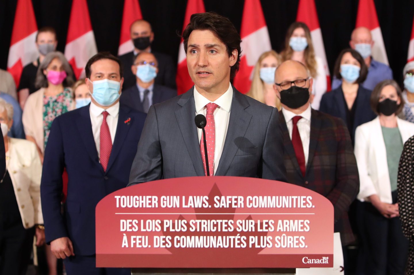 Photo of Canadian Prime Minister Justin Trudeau speaking at a press conference regarding Canada's new firearm legislation