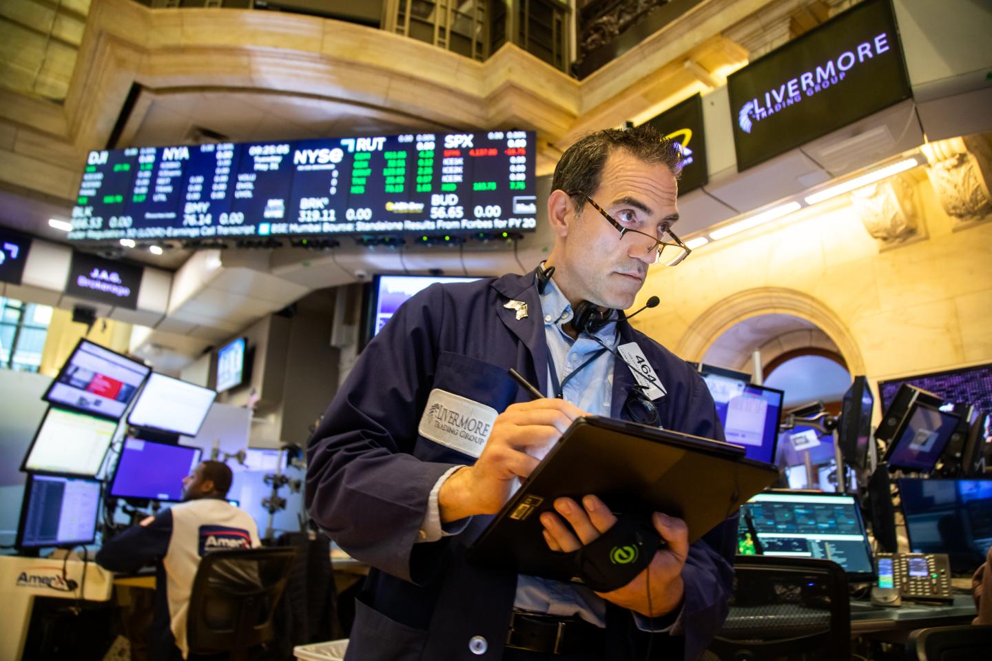 A trader works on the floor of the New York Stock Exchange