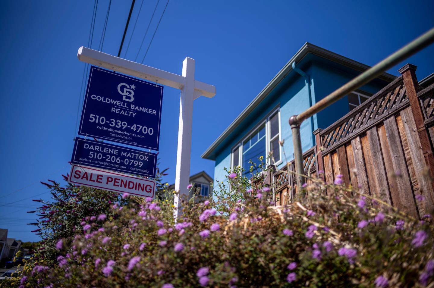 A "For Sale" sign outside a house in Crockett, California.