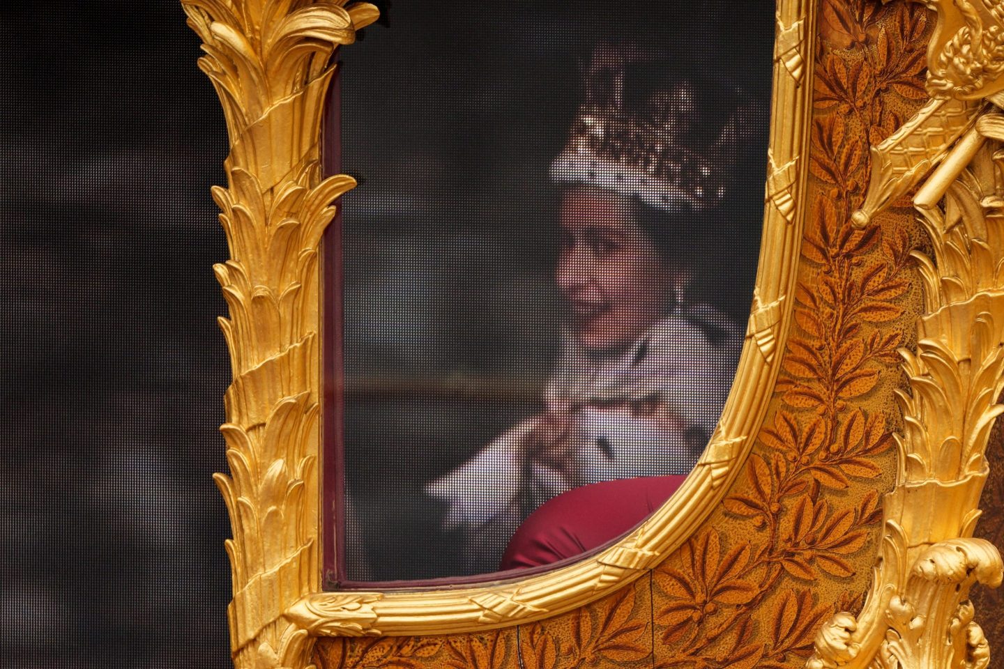 An hologram of Britain's Queen Elizabeth II is projected on the Gold State Coach during the Platinum Pageant in London on June 5 as part of Queen Elizabeth II's platinum jubilee celebrations. - The curtain comes down on four days of momentous nationwide celebrations to honour Queen Elizabeth II's historic Platinum Jubilee with a day-long pageant lauding the 96-year-old monarch's record seven decades on the throne.