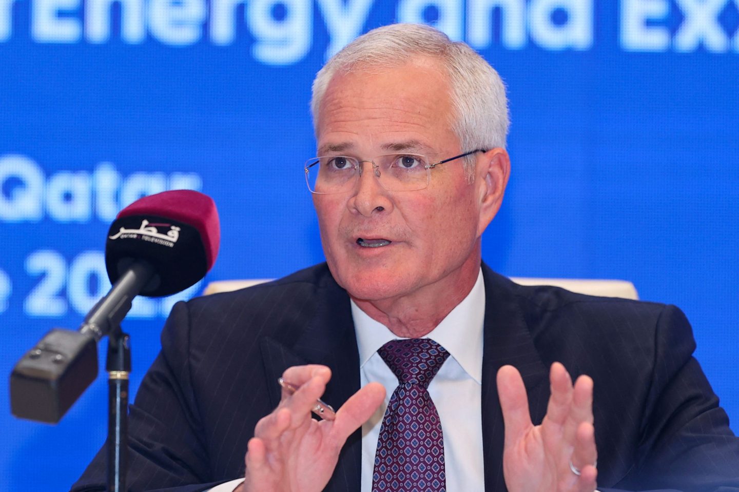 Exxon Mobil CEO Darren Woods warns of “high price” if the world transitions from fossil fuels too quickly.