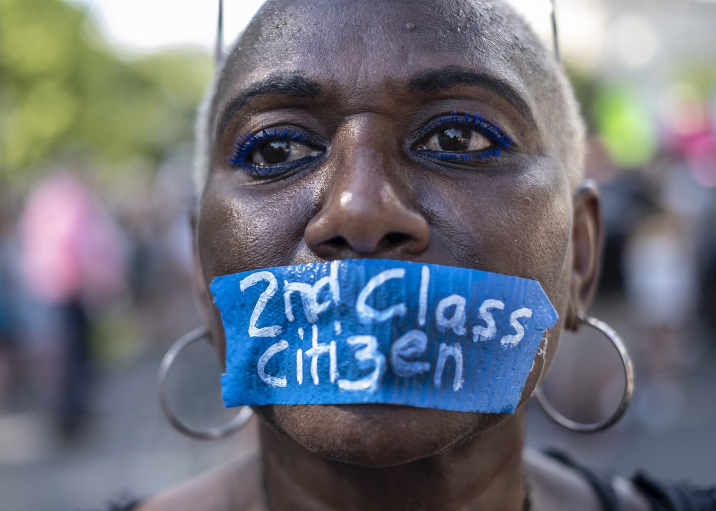 An abortion rights activist Nadine Seiler wears tape on her mouth with the words "Second Class Citizen" while protesting in front of the Supreme Court building following the announcement to the Dobbs v Jackson Women's Health Organization ruling in Washington D.C. The Court's decision in Dobbs v Jackson Women's Health overturns the landmark 50-year-old Roe v Wade case and erases a federal right to an abortion.