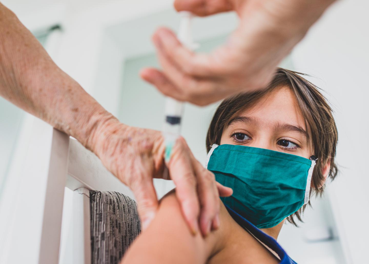 Child receiving vaccine shot